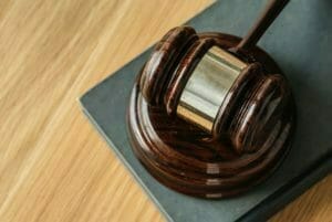 Picture of a judges gavel for the Real Wealth Show Podcast Episode #658